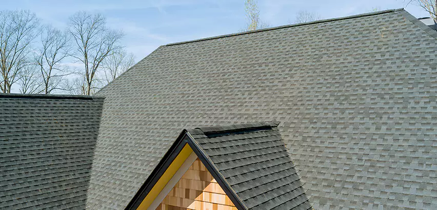 Replacing Vinyl Siding With Cedar Shingles in Cottage Grove
